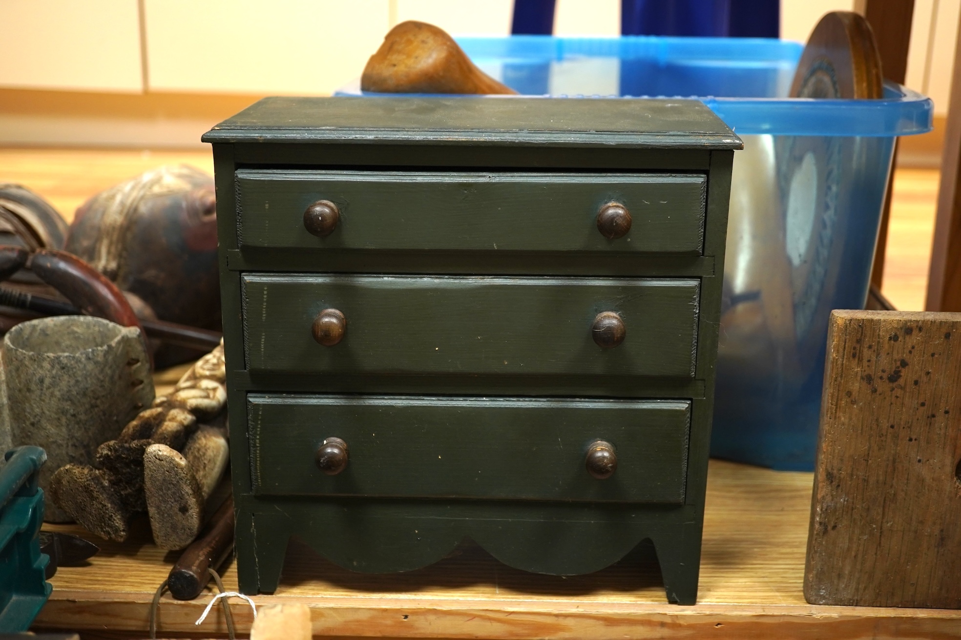 A painted pine miniature chest of drawers, various boot trees etc, chest 26cm x 26cm